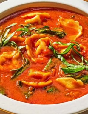 Tomato tortellini soup in a bowl.