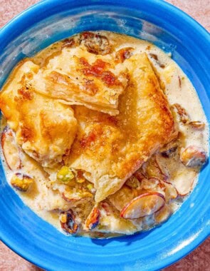 A serving of bread pudding in a bowl.